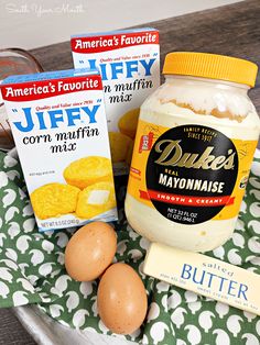 eggs, butter, and other ingredients are on a tray with a green polka dot tablecloth