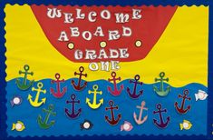 a bulletin board with an anchor theme and the words welcome aboard grade one on it