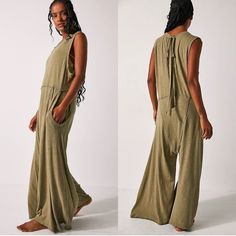 New Free People Homebody Oversized Tie Back Romper One Piece Jumpsuit Green Size Medium New Without Tags Effortlessly Easy And Ultra-Soft, This Slouchy One-Piece Is Featured In A Sleeveless Silhouette And Relaxed Fit With Billowy Wide Legs And Adjustable Tie-Back Detail. Fit: Shapeless, Relaxed Fit; Wide-Leg Style Features: Soft Cotton Jersey, Lightweight Design, Scoop Neckline, Sleeveless Silhouette, Pockets For Hands, Drop-Crotch Harem-Style, Exposed Seams, Adjustable Tie-Back Detail With Cuto Oversized Solid Color Jumpsuits And Rompers For Loungewear, Oversized Solid Color Loungewear Jumpsuits And Rompers, Oversized Solid Color Loungewear Jumpsuit, Solid Color Oversized Jumpsuit For Loungewear, Cotton Wide Leg Jumpsuits And Rompers For Loungewear, Cotton Wide-leg Jumpsuits And Rompers For Loungewear, Oversized Jumpsuits And Rompers For Summer Loungewear, Oversized Jumpsuits And Rompers For Lounging In Spring, Sleeveless Relaxed Jumpsuits And Rompers For Spring