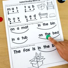 a hand is pointing to the word in front of a printable worksheet