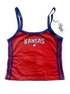 a red tank top with kansas written on the front and blue trimming around the bottom