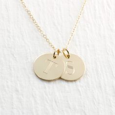 "Gorgeous double solid gold initial necklace... the perfect gift! PICTURE IS ENLARGED TO SHOW DETAIL! PLEASE READ BELOW FOR ACTUAL MEASUREMENTS!! Two solid gold 1/2\" discs have been personalized just for you with my 7mm typewriter font. The pendants are engraved with your choice of letters (entire alphabet in typewriter font shown in second picture) They hang from a solid 14k gold 1.5mm cable chain in either 16, 18, or 20\" in length. PLEASE REMEMBER PICTURES ARE TAKEN CLOSE UP TO SHOW DETAIL. Classic Necklaces With Initial Pendant For Anniversary, Classic Necklaces For Anniversary With Initial Pendant, Personalized Tan Pendant Necklace, Initial Pendant Necklace For Anniversary Gift, Classic Initial Pendant Necklace For Anniversary, Yellow Gold Initial Pendant Jewelry With Initials, Dainty 14k Stamped Initial Pendant Necklace, Classic 14k Gold Initial Charm Necklaces, Pendant Initial Necklace For Anniversary Gift