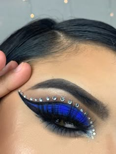 Blue Makeup Looks Lips, Blue Makeup Inspo Aesthetic, Royal Blue And Sliver Makeup, Blue Makeup Looks Rhinestones, Blue Soft Makeup Looks, Dark Blue And Gold Eye Makeup, Royal Blue And Black Makeup Looks, Blue Makeup Ideas For Black Women, Blue Diamond Makeup Looks