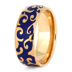 a blue and gold ring with an intricate design