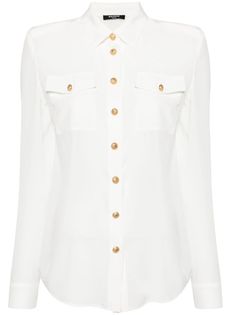 white silk semi-sheer construction embossed gold-tone buttons pointed flat collar front button fastening shoulder pads long sleeves buttoned cuffs two chest flap pockets curved hem Balmain Shirt, Pointed Flat Collar, Military Inspired Jacket, Flat Collar, White Silk, Emilio Pucci, Silk Crepe, Denim Pant, Silk Shirt