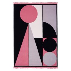 an abstract rug with pink, black and white shapes on the bottom one side has a large circle in the middle