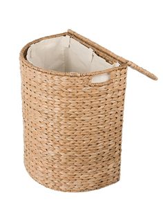 an empty wicker basket with handles on the bottom and inside, is shown in front of a white background