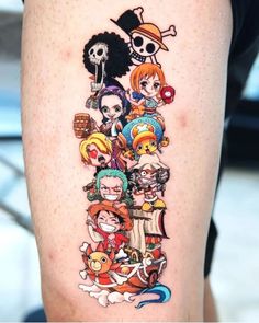 a person with a tattoo on their leg that has many cartoon characters all over it