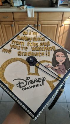 a decorated graduation cap that says, i'm my harley davidson you're watching me graduate