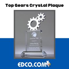 the top gear crystal plaque is displayed on a blue and white background with an image of gears