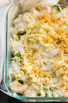 a casserole dish with chicken, broccoli and cheese