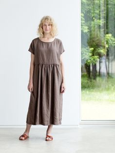 "Handcrafted Oeko-Tex Standard certified 100% European linen smock dress ideal for everyday wear. Perfect for springtime or chilly summer days. Always dress to kill! Neckline: round Silhouette: shift Length: ±48\"/120cm (we can make adjustments) Sleeve length: short Pockets: side seam Details: *Colour shown: moss green/ wood brown/ blue *Model is wearing size M *Medium weight *Maternity-friendly *Relaxed fit *Not-ironed (and no need to) *Handmade by @LinenCloud Easy care: - Machine wash gentle - Casual Brown Linen Dress With Relaxed Fit, Summer Brown Linen Daywear Dress, Casual Linen Maxi Dress With Relaxed Fit, Spring Everyday Relaxed Fit Dresses, Casual Flax Linen Dress With Relaxed Fit, Casual Linen Dress With Relaxed Fit, Casual Flax Color Relaxed Fit Dress, Casual Relaxed Fit Linen Dress, Relaxed Linen Midi Dress For Daywear