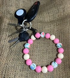 Homemade Silicone Keychains Message for custom designs. Multicolor Beaded Bracelets, Handmade Pink Bracelet For Everyday Use, Handmade Pink Bracelet For Everyday, Adjustable Beaded Bracelets For Personal Use, Silicone Keychains, Keychains For Women, Bracelet Keychains, Keychain Wristlet, Silicone Bracelets