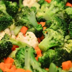 broccoli, cauliflower and carrots are mixed together