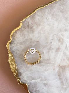 14k gold filled beaded ring with white bead with gold heart. Please note your ring size in description as this ring is not one size fits all. Initial Bracelet Gold, Fancy Things, Ring Heart, Beaded Ring, Initial Bracelet, Pink Stars, Name Bracelet, Personalized Initials, Beaded Rings