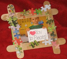 a child holding a sign that says you love to pieces