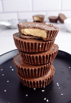 three chocolate cups stacked on top of each other