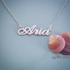 "Order any single word or name, for your new 14k WHITE Gold Lucia style name necklace! Choose any swarovski birthstone for the dot of the i, or the first capital letter . This listing is for one name with one capital letter!! *Nameplate and chain are all Solid 14k WHITE Gold. Some call this \"Real\" Gold.  *First capital letter is 1.0 cm tall (0.4 inches).  *Nameplate is 0.8 high quality thickness. *In the photo you can view the 2.0 gram high quality Box chain! *Choose your chain from the menu. Necklace Birthstone, The Dot, Star Chain, Gold Name Necklace, Personalized Pendant, Diamond Print, Box Chain, Style Classic, Name Necklace