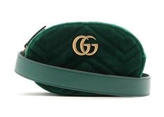 For SS18, Gucci reimagines its GG Marmont style in emerald-green quilted velvet for this belt bag. It's crafted in Italy, and features an antiqued gold-tone metal front plaque with the top-zip opening to a red satin lining. It's designed to be worn high on the waist, and can also be slung across the body and carried as a clutch, thanks to the detachable and adjustable buckle-fastening strap. Position yours over the house's separates for an on-brand look. Size 95cm Luxury Green Quilted Bag, Rectangular Leather Gucci Belt Bag, Luxury Rectangular Bags With Belt Detail, Luxury Formal Bag With Belt Detail, Luxury Belted Bag For Formal Occasions, Gucci Luxury Leather Belt Bag, Gucci Gg Marmont Matelasse, Velvet Belt, Quilted Velvet