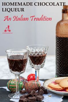 homemade chocolate liqueur in two glasses on a table next to cookies and crackers