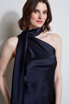 Chic and of the moment, our one shoulder dress features a romantic scarf detail that adds the glam factor to our favorite Satin. Dress it up with your favorite earrings & strappy sandals. Elie Tahari Exclusive Satin One Shoulder Dress with Scarf 80% Acetate, 20% Polyester Runs true to size. Model is 5'9" and wearing size 2 Length From Waist to Hem: Back 31"L (approx. length for size 6) Dry Clean Only Imported Style #: E401N604 Satin One Shoulder Dress, Dress With Scarf, Satin Scarf, Scarf Dress, Long Sleeve Short Dress, Elie Tahari, Knit Tees, Denim Coat, Satin Dress