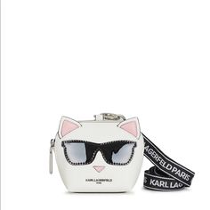 Karl Lagerfeld Paris Karl Head Mini Bag. Harlow Pvc Zipper Closure Silver Hardware Note: Lanyard Not Included. Size 4.5"W X 4"H X 2.5"D Color White/Black Care Instructions Wipe Clean Origin Imported