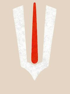 a red tie on top of a white piece of paper with the letter u in it