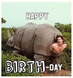 a man is posing with a rhinoceros in front of him that says happy birth - day