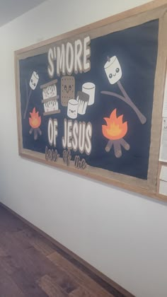 there is a sign on the wall that says s'more of jesus here at the campfire