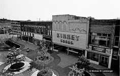 an old black and white photo of a town square in the 1950's or early 1960s's