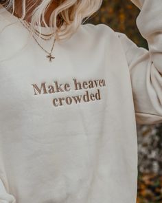 Represent and Share your faith with our Make ﻿﻿heaven crowded crew. These crews have a luxury soft feel that'll keep you warm while also being lightweight. Available in two colors; cream with brown embroidery and black with white embroidery. Model in cream wearing size medium Model in Black wearing size small Minimalist Sweatshirt Design, Cute Cricut Sweatshirt Ideas, Crew Neck Designs, Christian Apparel Aesthetic, Christian Boutique, Cricut Crew Neck Sweatshirt, Fall Embroidery Designs Sweatshirt, Fall Embroidered Sweatshirts, Embroidery Hoodies