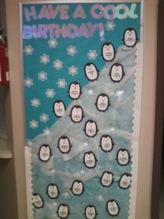 a bulletin board with penguins and snowflakes on it that says have a cool birthday