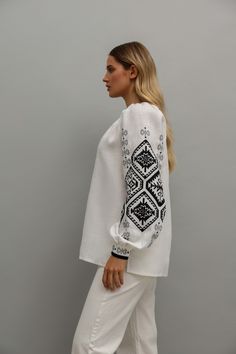 Folk Style Long Sleeve Linen Tops, Bohemian White Blouse With Embroidered Cuffs, White Bohemian Blouse With Embroidered Cuffs, Folk Style Embroidered Linen Top, Traditional Long Sleeve Linen Tops, Embroidered Linen Folk Tops, Folk Style Linen Top With Floral Embroidery, Folk Style White Tops With Woven Motifs, White Folk Tops With Woven Motifs