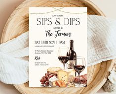 a wine and cheese themed sips and dips brunch party is set up on a wooden platter