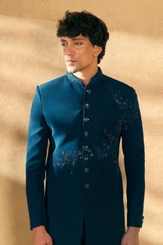 Blue sherwani with sequin, bead and threadwork embellished floral blossom motifs. Comes with pant. - Aza Fashions Embellished Unstitched Sherwani For Eid, Embellished Sherwani For Wedding And Diwali, Designer Sherwani With Floral Embroidery For Eid, Designer Sherwani With Floral Embroidery For Diwali, Designer Floral Embroidered Sherwani For Diwali, Festive Designer Sherwani With Floral Embroidery, Designer Floral Embroidery Sherwani For Diwali, Diwali Floral Embroidered Sherwani For Reception, Diwali Reception Sherwani With Floral Embroidery