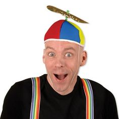 Grab everyone's attention, donning this elegant accessory. Believe you can fly with this spin in the wind-cyclone propeller party hat. Make way home for elegant additions to win everyone's praise. Product Features: Pack of 12 vibrantly colored hats. Propeller beanie party hat comes with a multi-color hat . Has a gold propeller that spins and an elastic chin strap. Hat is designed to turn and spin as you walk, run, or ride your bike. Great accessory for a theme party or Halloween . Dimensions: on Propeller Hat, Nerd Costumes, Yellow Color Combinations, Tweedle Dum, Tweedle Dee, Hat Aesthetic, Mad Hatter Tea Party, Party Kit, Elegant Accessories