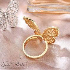 This unique butterfly ring captures the beautiful spirit of nature's most elegant creatures. It is a perfect gift for a woman who embodies what it means to be bold, beautiful and brave. Choose from alloy metal plated in 14K White Gold, 14K Yellow Gold or 14K Rose Gold Sparkling baguette and round stones form the wings and body Measures 3.2cm x 3cm Clear or pink zircon diamonds Adjustable from approximately size 5 to size 10 Unique Butterfly, Index Finger Rings, Baguette Ring, Festival Jewelry, Butterfly Ring, Knuckle Rings, The Wings, Sparkling Crystal, Mother Day Gifts