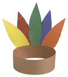 a paper hat with feathers on it