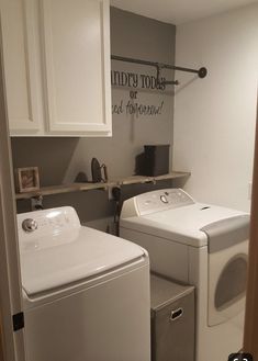 a washer and dryer sitting in a laundry room next to eachother