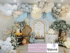 a room filled with lots of balloons and decorations