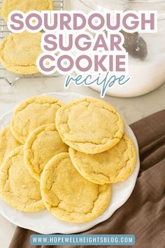 a white plate topped with cookies on top of a table