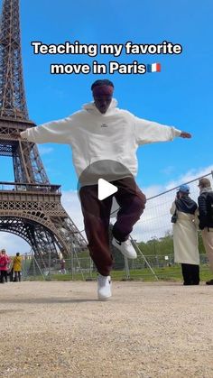 a man is dancing in front of the eiffel tower with words reading teaching my favorite move in paris