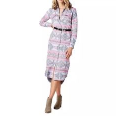 Jacquard Western Shirt Dress / Duster By Wrangler. Color Is "Pink Aztec." This Beautiful Dress / Duster Is Designed With A Traditional Western Jacquard Pattern, Offering A Unique And Stylish Look. It Features A Full Snap Front For Easy Wear And Removal, And A Classic Point Collar For A Touch Of Elegance. The Duster Is Crafted From Premium Quality Materials, Ensuring Lasting Durability And Providing Excellent Comfort. With Its Long Length And Full Sleeves, This Duster Offers Optimum Coverage And