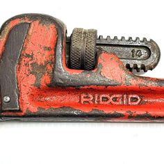 a close up of an old typewriter on a white background with the word rip aid written in red