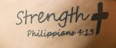 the word strength written in black ink on a woman's leg with a cross