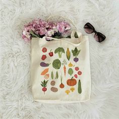 Go easy on the environment and carry your groceries home in this 100% cotton tote bag! * Q U I C K * F A C T S * ♥ Design is digitally printed on one side of the bag ♥ Material: 100% cotton ♥ Size: 15 3/4 inches by 15 ¼ inches ♥ Handle length: 21 ½ inches ♥ Spot clean by hand for best results * S H I P P I N G * T I M E S * ♥ Our items are individually made with love for each of our buyers. ♥ We're work as quickly as possible, but we realize speed is important to our customers! Our processing ti Natural Cotton Grocery Bag, Natural Cotton Grocery Bags, Eco-friendly Cotton Canvas Market Bag, Reusable Cotton Grocery Shopping Bags, Reusable Cotton Bags For Grocery Shopping, Reusable Organic Grocery Bags, Organic Reusable Grocery Bags, Eco-friendly Cotton Bags For Farmers Market, Eco-friendly Cotton Grocery Bag