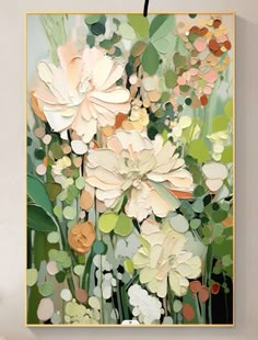 a painting hanging on the wall next to a vase with flowers in it and a plant