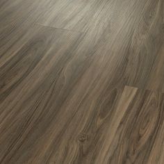 an image of wood flooring that looks like it has been painted in dark brown