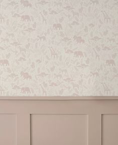 the wall paper has animals on it and is white with pink, gray or green