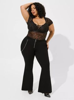 FIT Model is 5'10” wearing size 2. Bodysuit silhouette. MATERIALS + CARE Lace knit fabric. 88% nylon, 12% spandex. Machine wash cold. Line dry. . Imported. DETAILS Crew neckline. Short sleeves. The best plus size women's lace short sleeve bodysuit bodysuits in rich black made of lace. Torrid is your destination for the freshest spring and summer styles. Womens Lace Shorts, Lace Short, Short Sleeve Bodysuit, Lace Knitting, Bra Lingerie, Everyday Outfits, Lace Shorts, Knit Fabric, Fitness Models